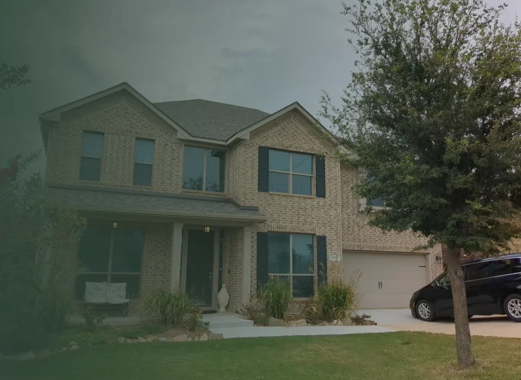 A car parked in front of a house